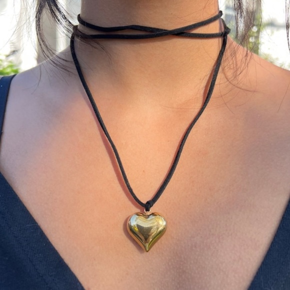 Puffed heart pendant on a long black wrap around cord necklace. - Picture 3 of 4